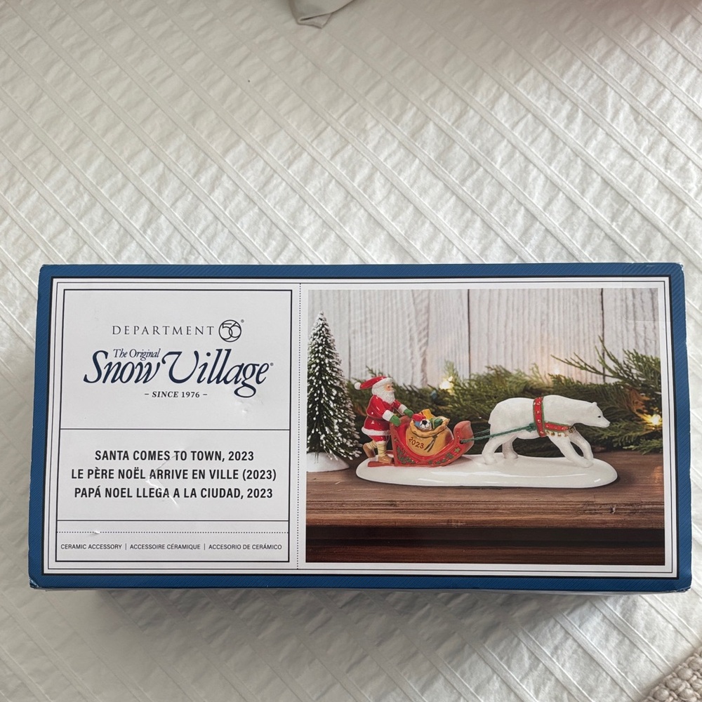 Department 56 Snow Village Santa with White Reindeer
